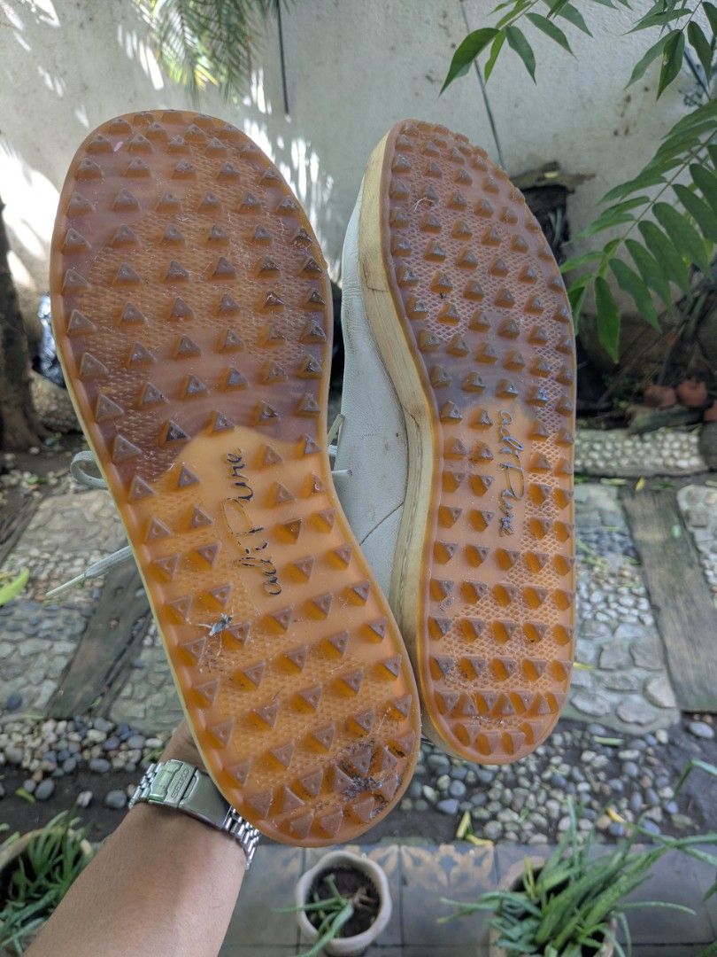 Adidas Adi Pure Golf Shoes (Category: Casual Shoes) located in Muntinlupa City. Submitted by tbibby_310 (Listing ID 1403475987, Image 2). Description: - Adidas Adi Pure golf shoes - Leather upper - Textured sole for grip - 'Adi Pure by Adidas' branded insoles - Visible signs of wear on upper and sole - White laces.