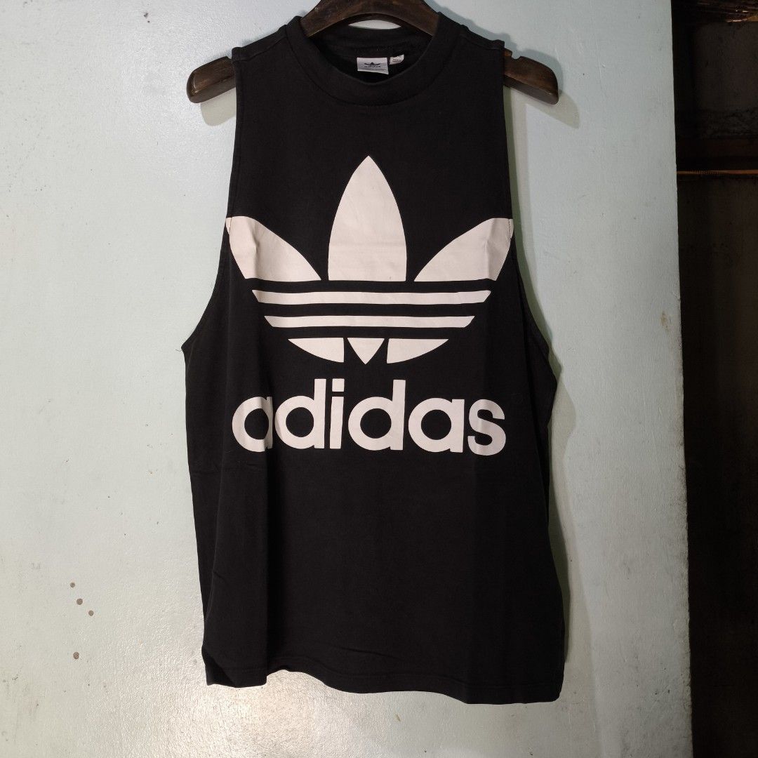 Adidas Trefoil Tank Top (Category: Activewear) located in Quezon City. Submitted by jedclo (Listing ID 1403529871, Image 1). Description: Size S to M Stretchable Width: 19 Length: 25 In pristine condition Color due lightning MOP: GCASH, DM to purchase Disclaimer: "All brand names, logos, and images are registered trademarks of their respective owners. No affiliation or copyright infringement intended.