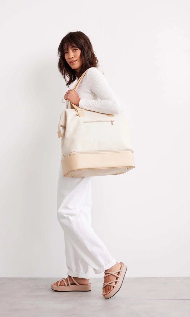 Beis Mini Weekender in Beige (Category: Tote Bags) located in Quezon City. Submitted by issastore (Listing ID 1403523078, Image 1). Description: Retails online for 4700 PHP Used twice and kept in storage In great condition Bought directly from the Beis website Comes with a detachable compartment for shoes, and has a strap at the back to put on your suitcase Perfect for travel and weekend trips and staycations Rimowa Alo Travel Club.