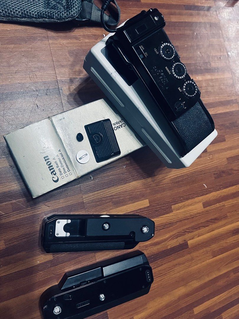 Canon A1 Canon AE1 program accessories *Power winder A/A2 *Data back *body grip * pc socket cover (Category: Cameras) located in Quezon City. Submitted by djdjdjdjdjdj (Listing ID 1403534984, Image 2). Description: Canon A1 Canon AE1 program accessories *Power winder A/A2 *Data back *body grip * pc socket cover.