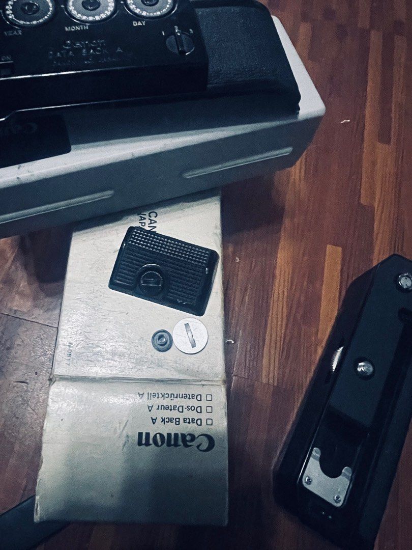 Canon A1 Canon AE1 program accessories *Power winder A/A2 *Data back *body grip * pc socket cover (Category: Cameras) located in Quezon City. Submitted by djdjdjdjdjdj (Listing ID 1403534984, Image 3). Description: Canon A1 Canon AE1 program accessories *Power winder A/A2 *Data back *body grip * pc socket cover.