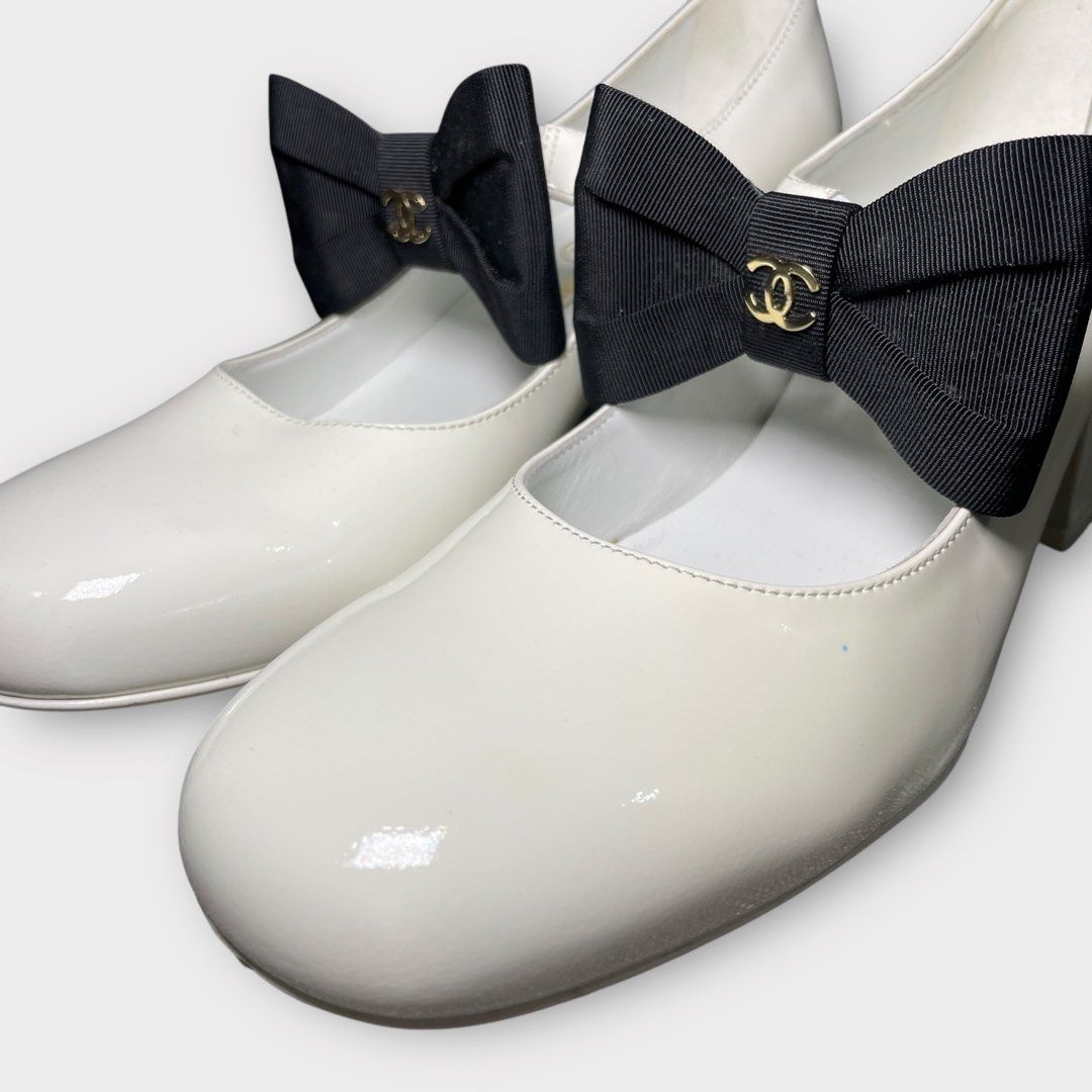 Chanel - Interlocking CC Logo Bow White Patent Mary Jane Heels (Category: Heels) located in Los Banos. Submitted by declutterking (Listing ID 1403611405, Image 3). Description: Size 36C Pair only Excellent condition Minimal signs of use Authentic.