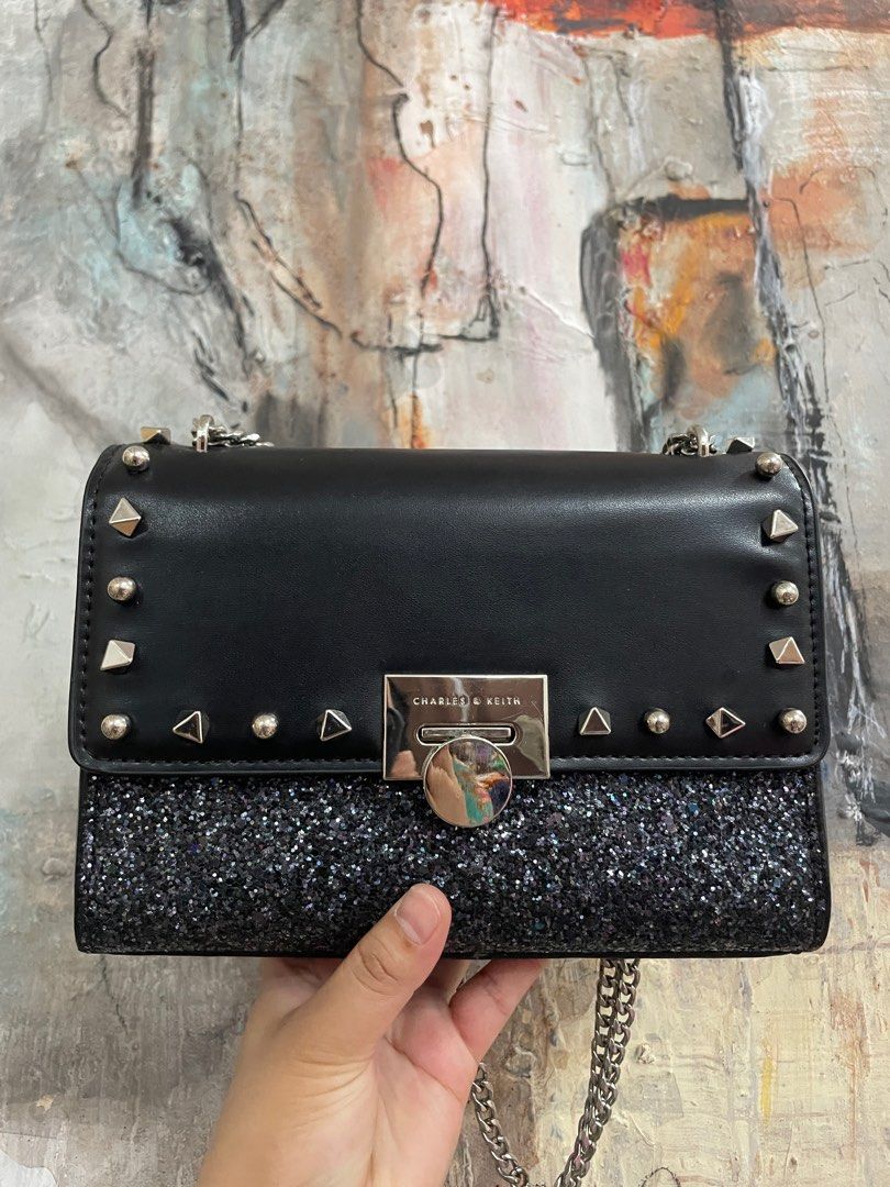 Charles & Keith Studded Glitter Shoulder Bag (Category: Shoulder Bags) located in Las Pinas. Submitted by thingsupforgrab (Listing ID 1403530002, Image 1). Description: It has scratches in hardware (kindly check last photo) but still in excellent condition..