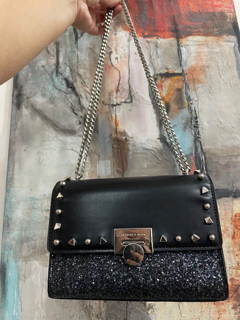 Charles & Keith Studded Glitter Shoulder Bag (Category: Shoulder Bags) located in Las Pinas. Submitted by thingsupforgrab (Listing ID 1403530002, Image 3). Description: It has scratches in hardware (kindly check last photo) but still in excellent condition..