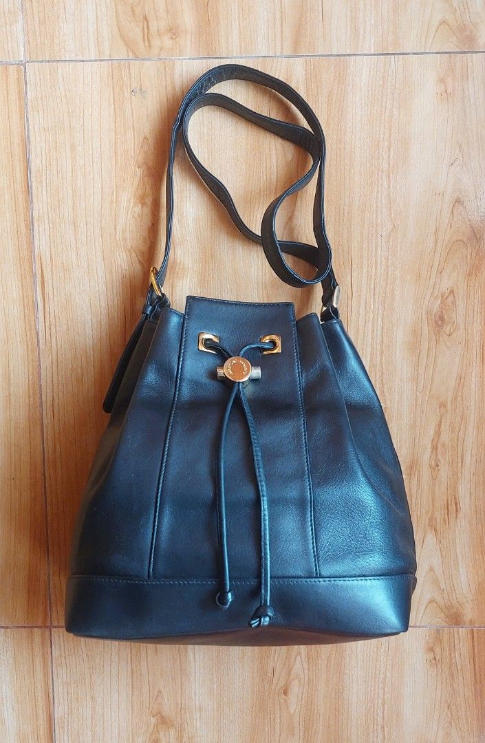 Emanuel Ungaro Black Bucket Bag (Category: Luxury Bags & Wallets) located in Davao. Submitted by wengbagstuff (Listing ID 1403599065, Image 2). Description: 🔹️ genuine leather 🔹️ no tear or holes 🔹️ vintage bag bucket by Emanuel Ungaro.