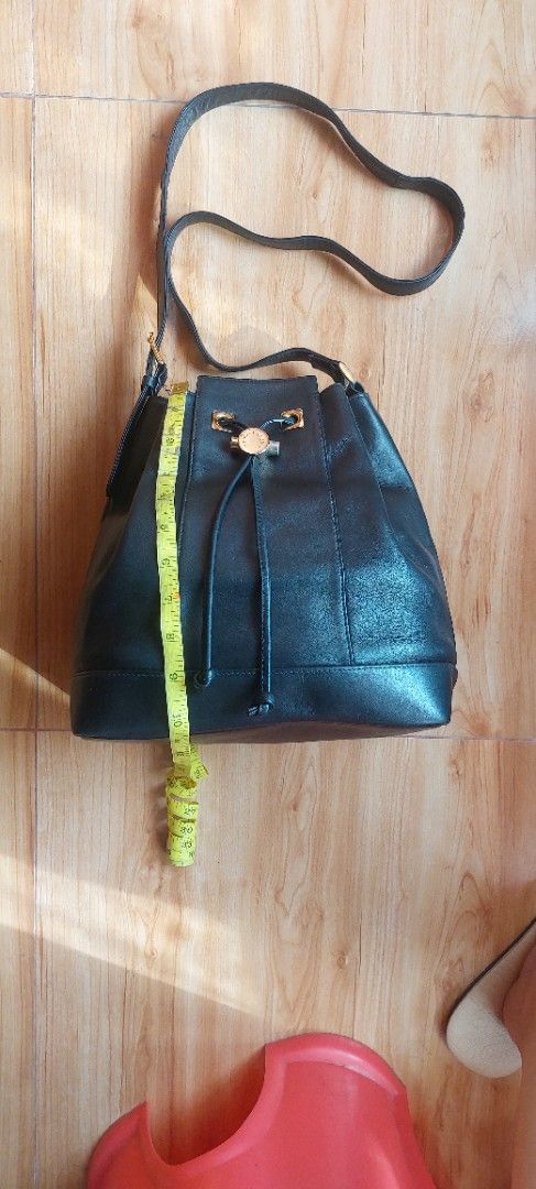 Emanuel Ungaro Black Bucket Bag (Category: Luxury Bags & Wallets) located in Davao. Submitted by wengbagstuff (Listing ID 1403599065, Image 3). Description: 🔹️ genuine leather 🔹️ no tear or holes 🔹️ vintage bag bucket by Emanuel Ungaro.