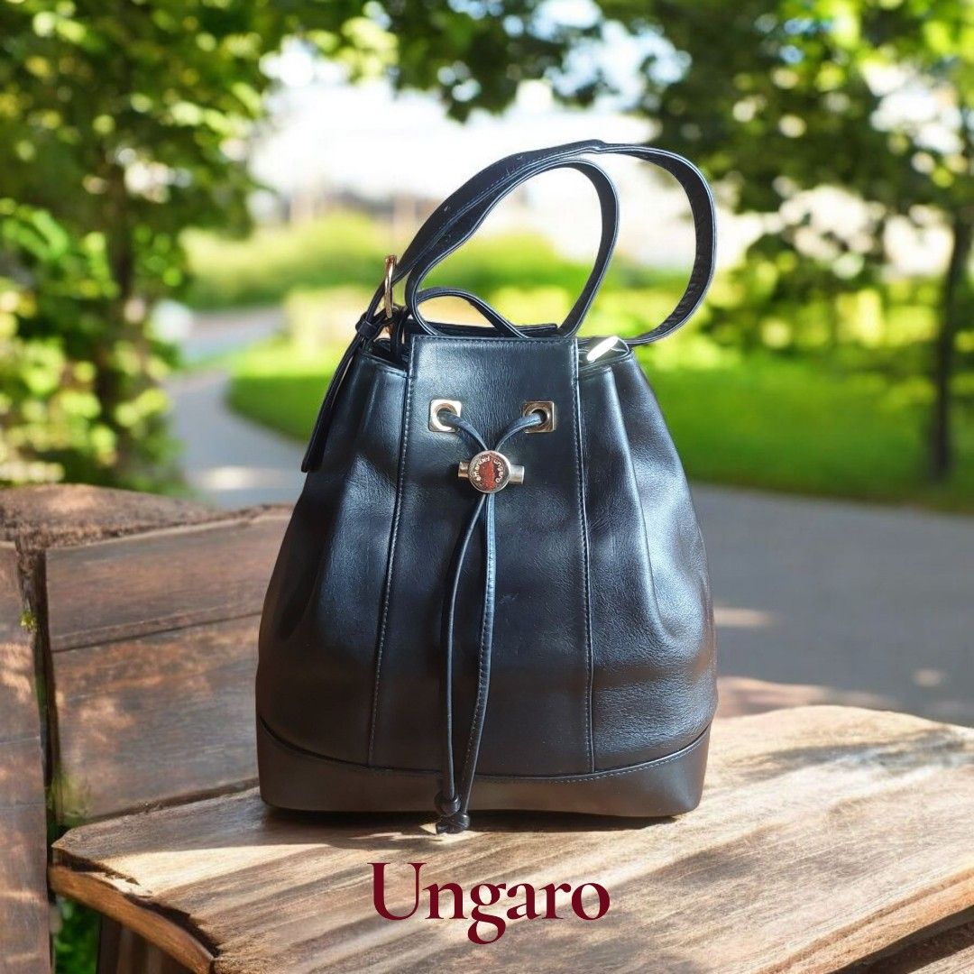 Emanuel Ungaro Black Bucket Bag (Category: Luxury Bags & Wallets) located in Davao. Submitted by wengbagstuff (Listing ID 1403599065, Image 1). Description: 🔹️ genuine leather 🔹️ no tear or holes 🔹️ vintage bag bucket by Emanuel Ungaro.