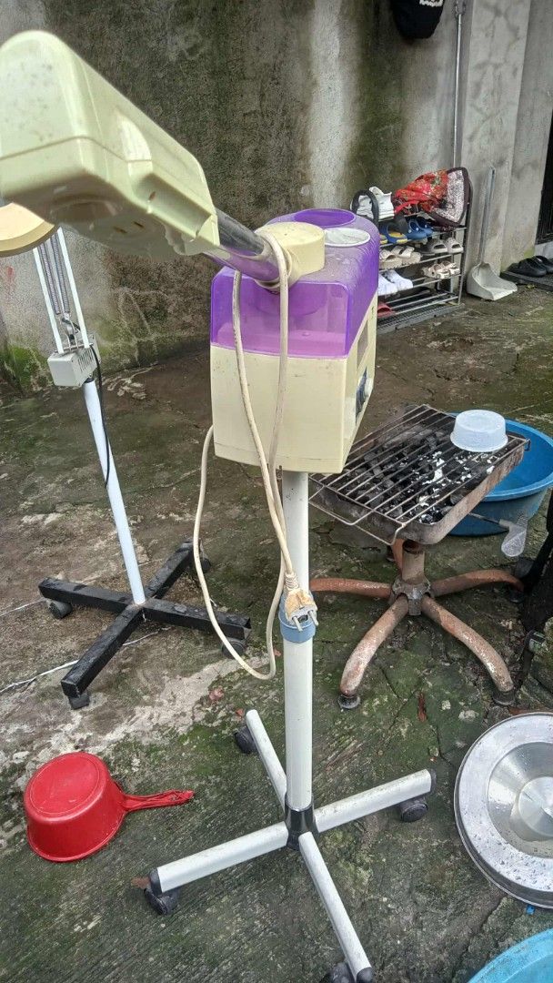 Facial Steamer with Stand (Category: Face Care) located in Manila. Submitted by wisegem-231b (Listing ID 1403466843, Image 1). Description: - Facial steamer with stand - Stylish cream and purple design - Features a nozzle for directed steam - In excellent working condition - Perfect for professional salons or home use.