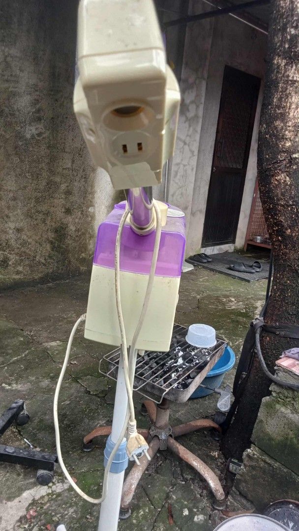 Facial Steamer with Stand (Category: Face Care) located in Manila. Submitted by wisegem-231b (Listing ID 1403466843, Image 2). Description: - Facial steamer with stand - Stylish cream and purple design - Features a nozzle for directed steam - In excellent working condition - Perfect for professional salons or home use.