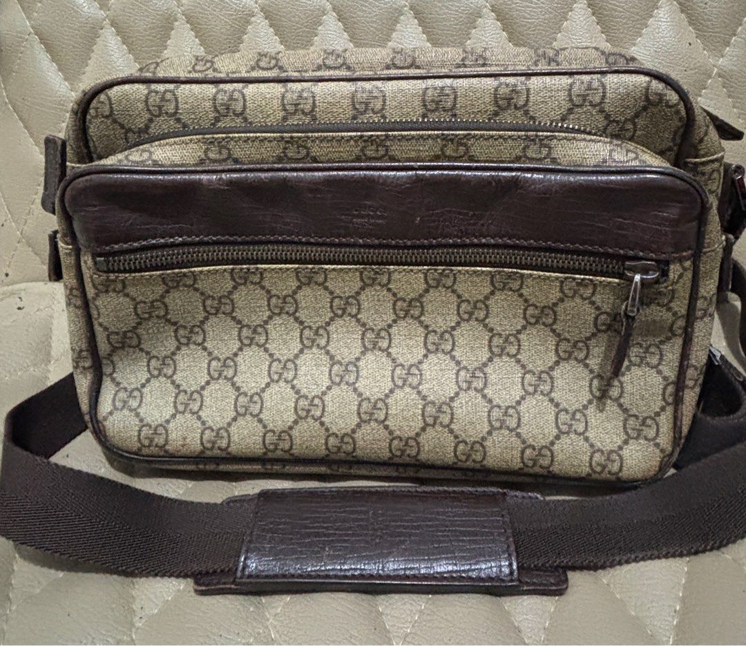 Gucci GG Supreme Shoulder Bag (Category: Luxury Bags & Wallets) located in Quezon City. Submitted by dmanille (Listing ID 1403103176, Image 1). Description: - Authentic Gucci shoulder bag - Iconic GG Supreme canvas - Brown leather trim and shoulder strap - Multiple compartments with zipper closures - Classic design, perfect for everyday use With normal leather scratches , no tear on the GG leather.