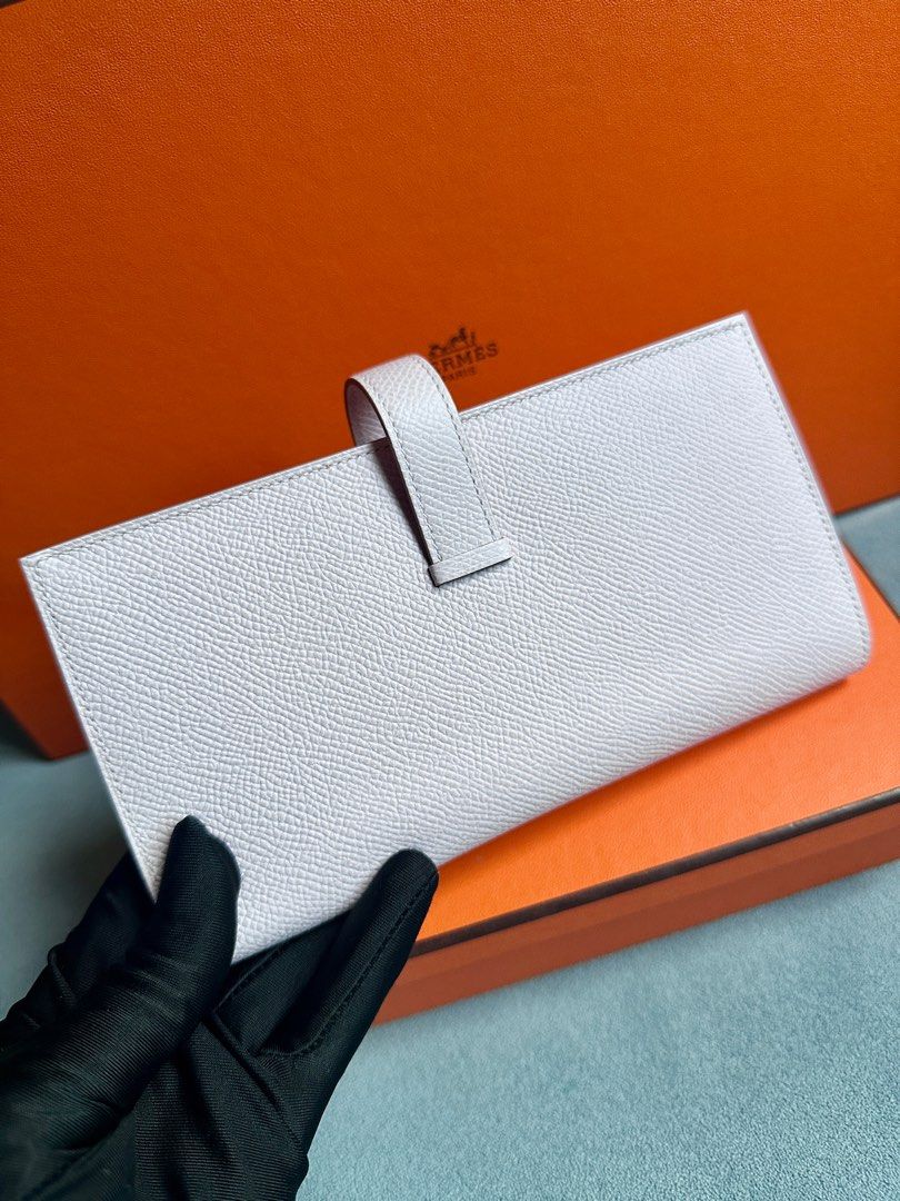 Hermes Bearn Long Wallet (Category: Luxury Bags & Wallets) located in Taguig. Submitted by zhuluxeitems (Listing ID 1403466776, Image 2). Description: Mauve Pale Palladium Hardware Stamp U. Authentic. Brandnew. Complete Inclusions. Location: BGC Taguig .