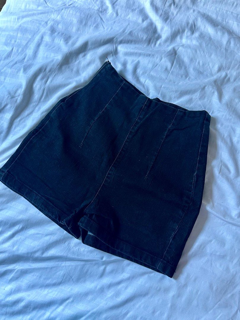High-Waisted Denim Short or Skort (Category: Shorts) located in Taguig. Submitted by dentisimo (Listing ID 1403508548, Image 1). Description: - High-waisted denim shorts - Dark wash - Fitted silhouette - Side zipper closure - Two back pockets - Perfect for casual wear - Versatile and stylish - broken zipper.