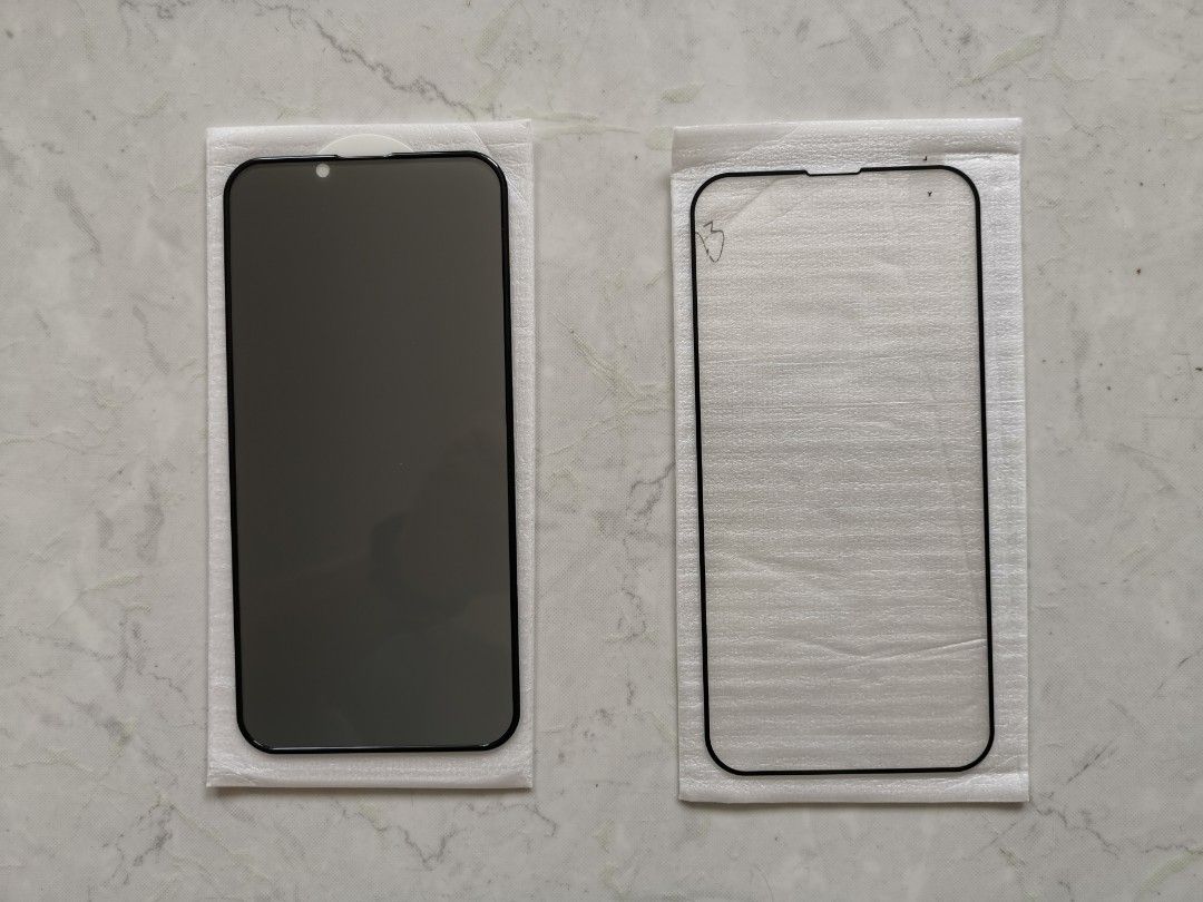 iPhone 13 screen protector (Category: Other Mobile & Gadget Accessories) located in Singapore. Submitted by windtalkerknight (Listing ID 1403474607, Image 1). Description: iPhone 13 screen protector One transparent, one is dark color Price for both..
