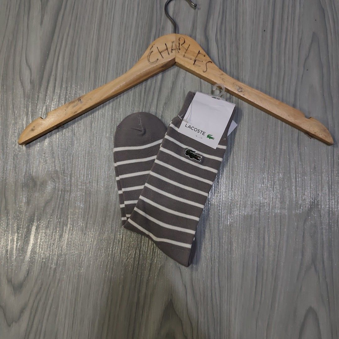 Lacoste high sock stripe (Category: Socks) located in Bauan. Submitted by fast_transact (Listing ID 1403580807, Image 2). Description: lacoste sock - high socks - stripe grey white - Lacoste embroidered logo - Comfortable fabric.