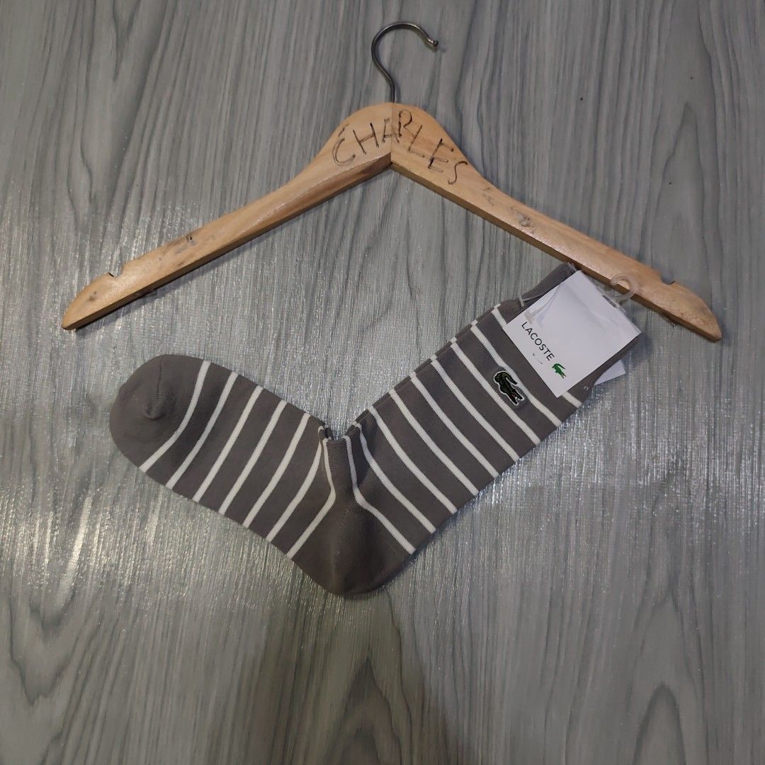 Lacoste high sock stripe (Category: Socks) located in Bauan. Submitted by fast_transact (Listing ID 1403580807, Image 1). Description: lacoste sock - high socks - stripe grey white - Lacoste embroidered logo - Comfortable fabric.