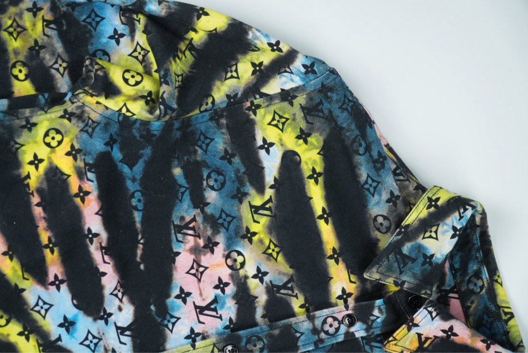 Louis Vuitton Tie-Dye Shirt (Category: Luxury Apparel) located in Manila. Submitted by aevan143 (Listing ID 1403508755, Image 2). Description: - Louis Vuitton Tie-Dye Shirt - Size: Large - Made in Italy - Features a vibrant tie-dye pattern - Adorned with the iconic LV monogram - A luxury statement piece.
