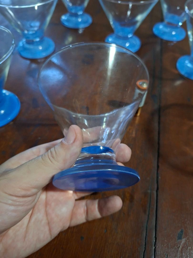 Martini glass (Category: Bakeware) located in Taguig. Submitted by d_man11 (Listing ID 1403567967, Image 3). Description: - Martini glasses - Classic martini shape - Features a blue base - Ideal for cocktails - In good condition - take all 8 pieces for only 400.