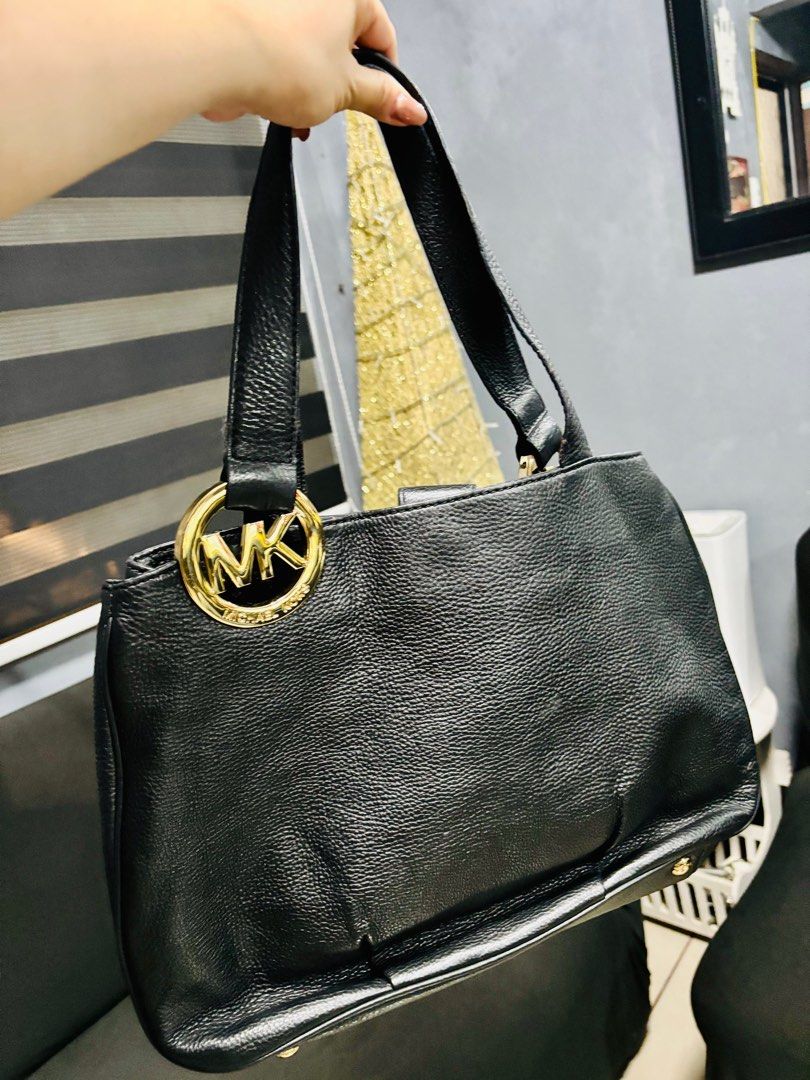 Michael Kors Fulton Hobo Shoulder Bag (Category: Luxury Bags & Wallets) located in Marilao. Submitted by 12forkeeps (Listing ID 1403603293, Image 3). Description: - Authentic Michael Kors Fulton Hobo bag - Made of genuine black leather - Features a gold-tone MK logo - Selling for ₱3,700.