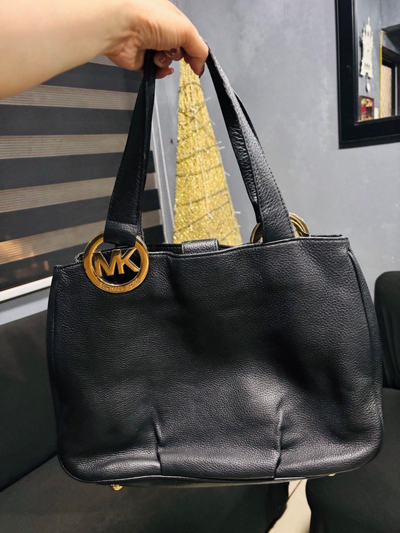 Michael Kors Fulton Hobo Shoulder Bag (Category: Luxury Bags & Wallets) located in Marilao. Submitted by 12forkeeps (Listing ID 1403603293, Image 2). Description: - Authentic Michael Kors Fulton Hobo bag - Made of genuine black leather - Features a gold-tone MK logo - Selling for ₱3,700.