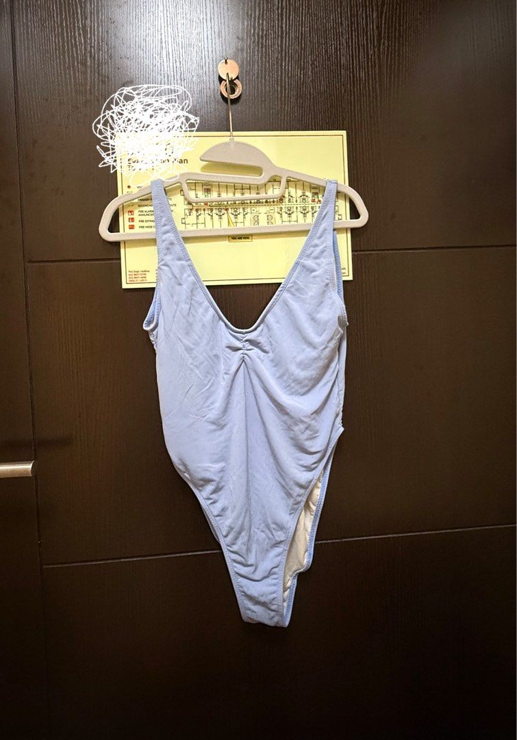 Millaswim One Piece Swimsuit (M) (Category: Bikinis & Swimsuits) located in Makati City. Submitted by ancsc (Listing ID 1403597887, Image 1). Description: First photo not mine, for reference only - Powder blue one-piece swimsuit - Size: M - Design: Scoop neckline, high-cut leg - Detail: Ruched bust - Material: Smooth, stretchy fabric.