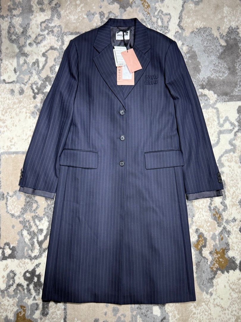 Miu Miu Pinstripe Coat Size 40 (Category: Luxury Apparel) located in Manila. Submitted by aevan143 (Listing ID 1403511554, Image 1). Description: - Authentic Miu Miu coat - Size 40 - Pinstripe design - Classic lapel - Three-button closure - Embroidered Miu Miu logo - Includes original tags - Made in Italy.
