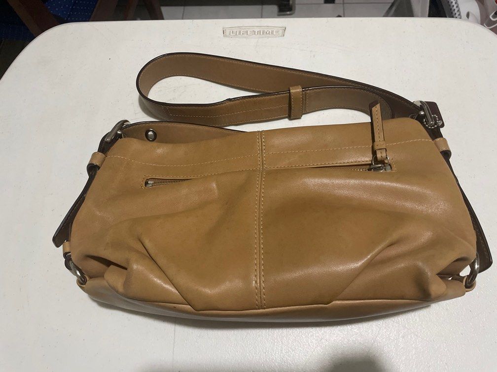 Original Coach Tan hobo mesenger bag (Category: Shoulder Bags) located in Las Pinas. Submitted by alsaclayan (Listing ID 1403520657, Image 2). Description: Need to sell a lot of my items because I’m moving out soon. All original from US and Europe. I don’t have boxes or paperbags because I did not intend to sell them, they were for my personal use. Well taken care of and kept in my bag/shoe closet..