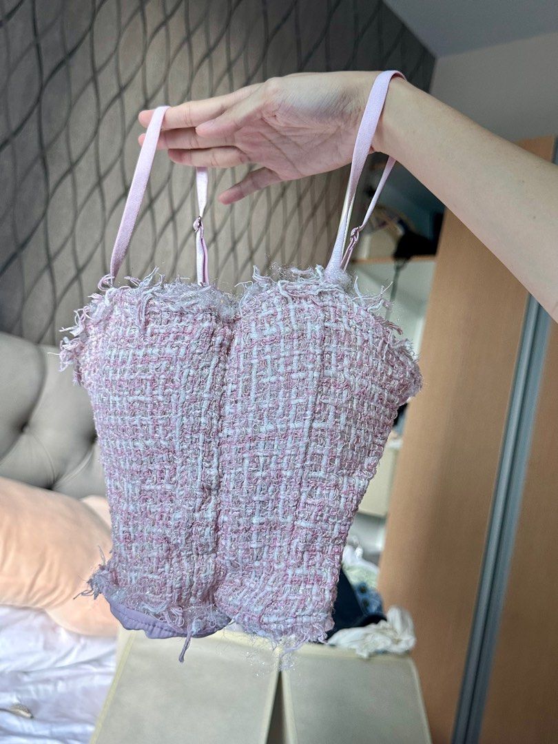 Pink Tweed Corset Top (Category: Sleeveless) located in Taguig. Submitted by dentisimo (Listing ID 1403508283, Image 1). Description: - Pink tweed corset top - Bustier design - Adjustable straps - Woven fabric with pink and white threads - Ruffled trim - Shirred back for comfortable fit.