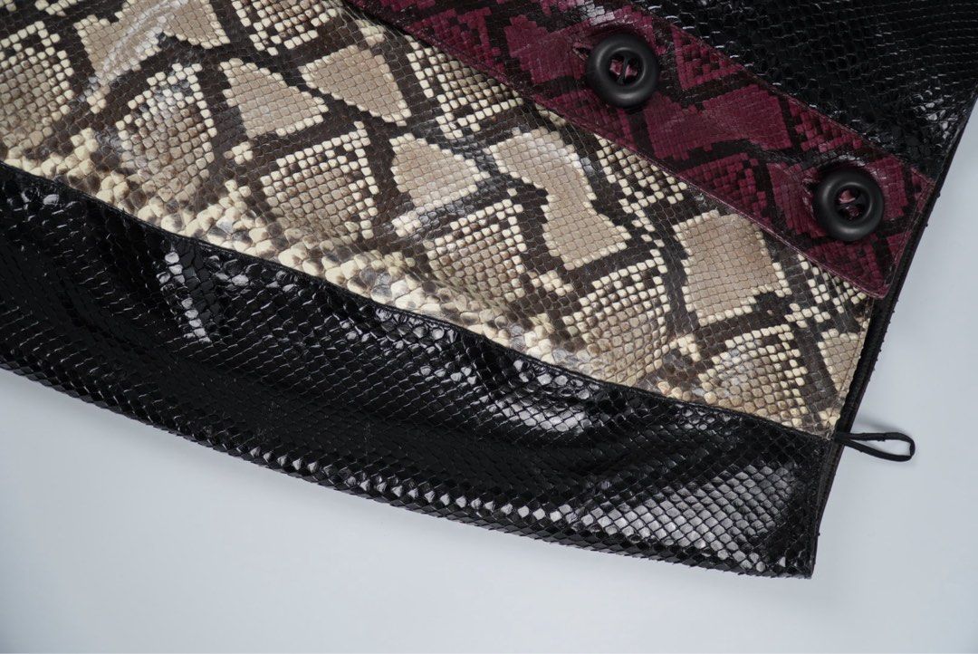 Prada Python Patch Skirt (Category: Luxury Apparel) located in Manila. Submitted by aevan143 (Listing ID 1403508568, Image 3). Description: - Prada Python Patch Skirt - Size: S - Features a unique patchwork design - Made with genuine python skin - A luxury statement piece.