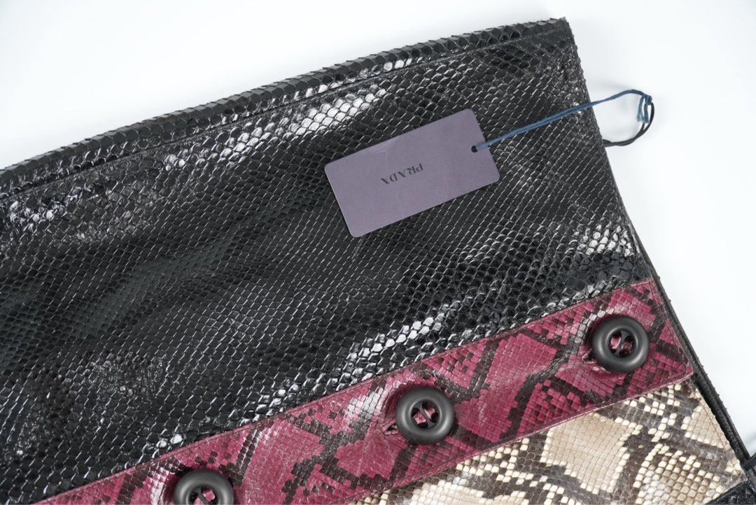 Prada Python Patch Skirt (Category: Luxury Apparel) located in Manila. Submitted by aevan143 (Listing ID 1403508568, Image 2). Description: - Prada Python Patch Skirt - Size: S - Features a unique patchwork design - Made with genuine python skin - A luxury statement piece.