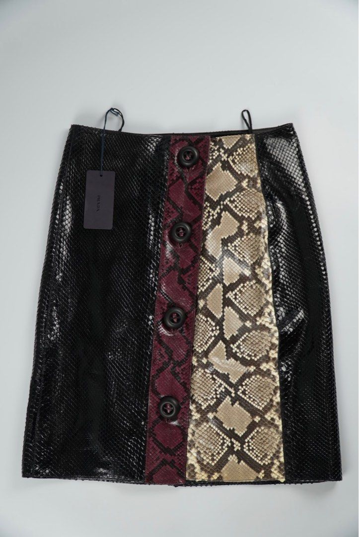 Prada Python Patch Skirt (Category: Luxury Apparel) located in Manila. Submitted by aevan143 (Listing ID 1403508568, Image 1). Description: - Prada Python Patch Skirt - Size: S - Features a unique patchwork design - Made with genuine python skin - A luxury statement piece.