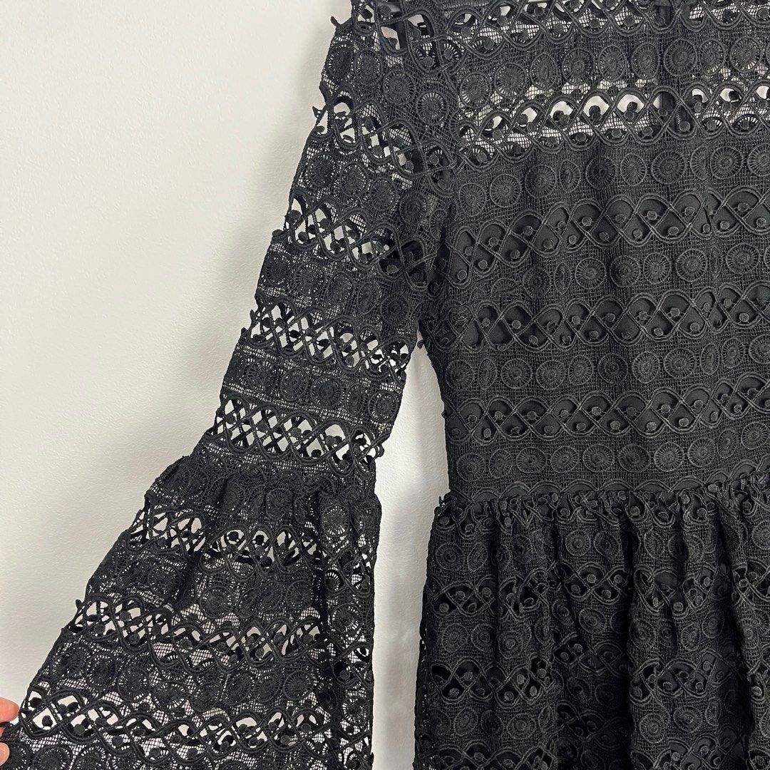 Seed Heritage Black Lace Dress Size 10 (Category: Women's Clothes) located in Melbourne. Submitted by zahrashxh (Listing ID 1403497040, Image 2). Description: Excellent condition, worn once. No signs of wear. Size 10 Midi length dress with long bell sleeves Body is lined and arms are see through Pickup from Meadow Heights. Can deliver / post at extra cost..