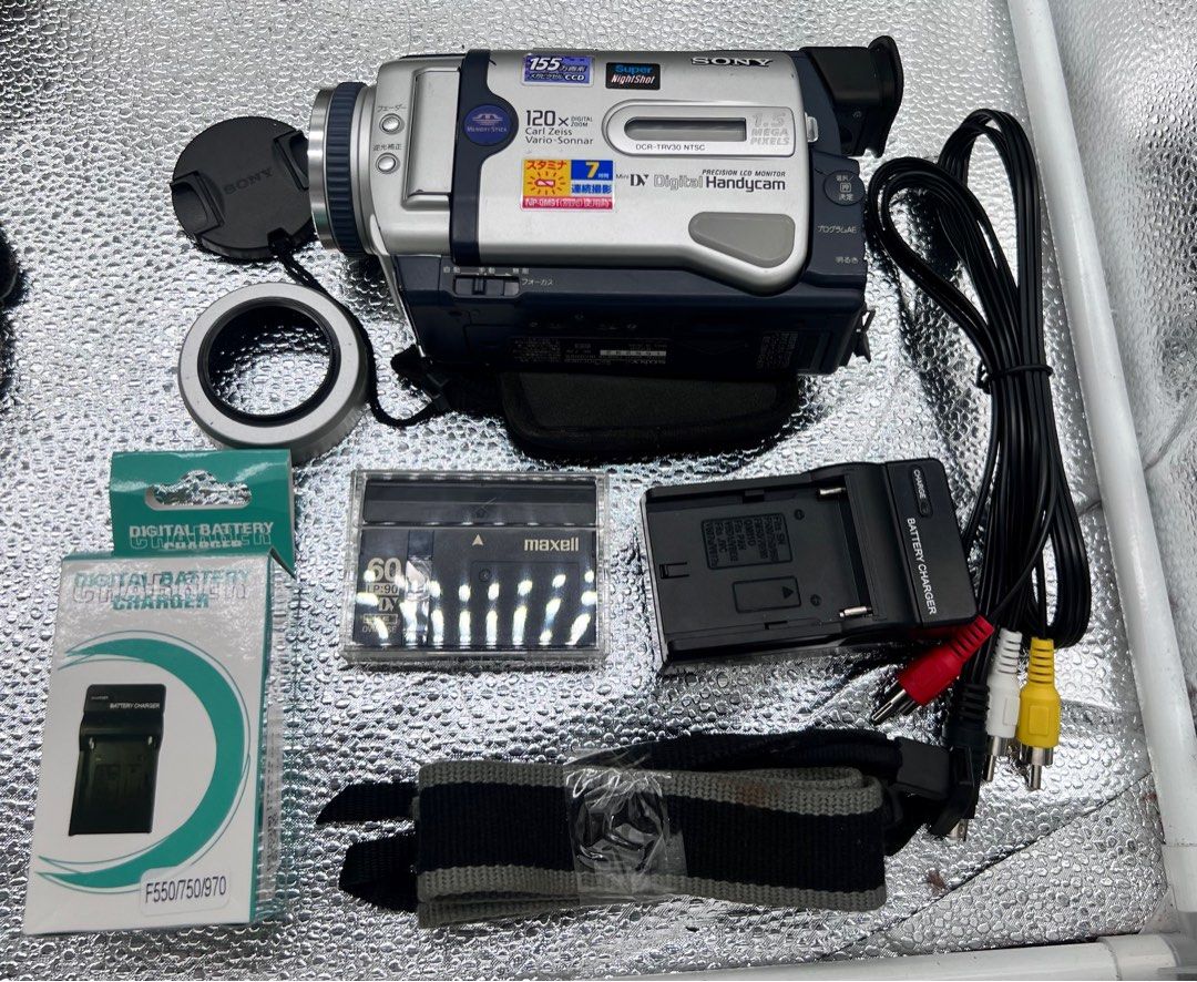 SONY DCR-TRV30 Mini DV Camcorder (1998) (Category: Video Cameras) located in Makati City. Submitted by maka-luma (Listing ID 1403512267, Image 3). Description: SONY DCR-TRV30 Mini DV Camcorder (1998) FULLY WORKING ✔️ Record ✔️ 120x Servo Zoom ✔️ Powerful Night Vision ✔️ Rewind ✔️ Pause/Stop ✔️ Fast forward ✔️ Color Viewfinder ✔️ Color LCD ✔️ Program AE ✔️ Memory Stick Pro Slot ✔️ Tape eject ✔️ Diverse settings ✨Mint Condition ✨ ₱8,999 READY TO US