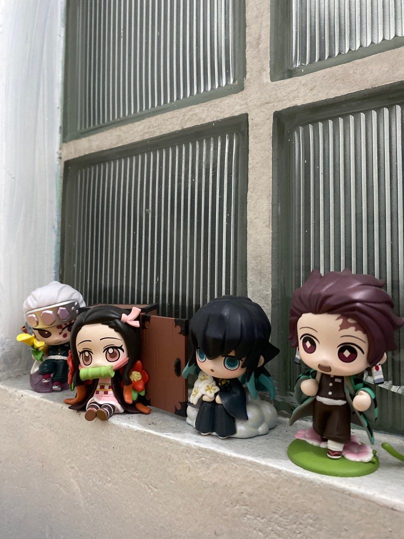 TAKE ALL (selling as set) Demon Slayer Mini Figures Set (Category: Figurines & Statues) located in Manila. Submitted by warm_everythingmustgo (Listing ID 1403595762, Image 1). Description: - Demon Slayer mini figure set. - Features Nezuko with her bamboo muzzle and Tanjiro in his checkered haori. - Includes other characters. - Each figure comes with a unique base. - Perfect for display! -NO BOX BUT WITH AUTHENTICITY CARDS.