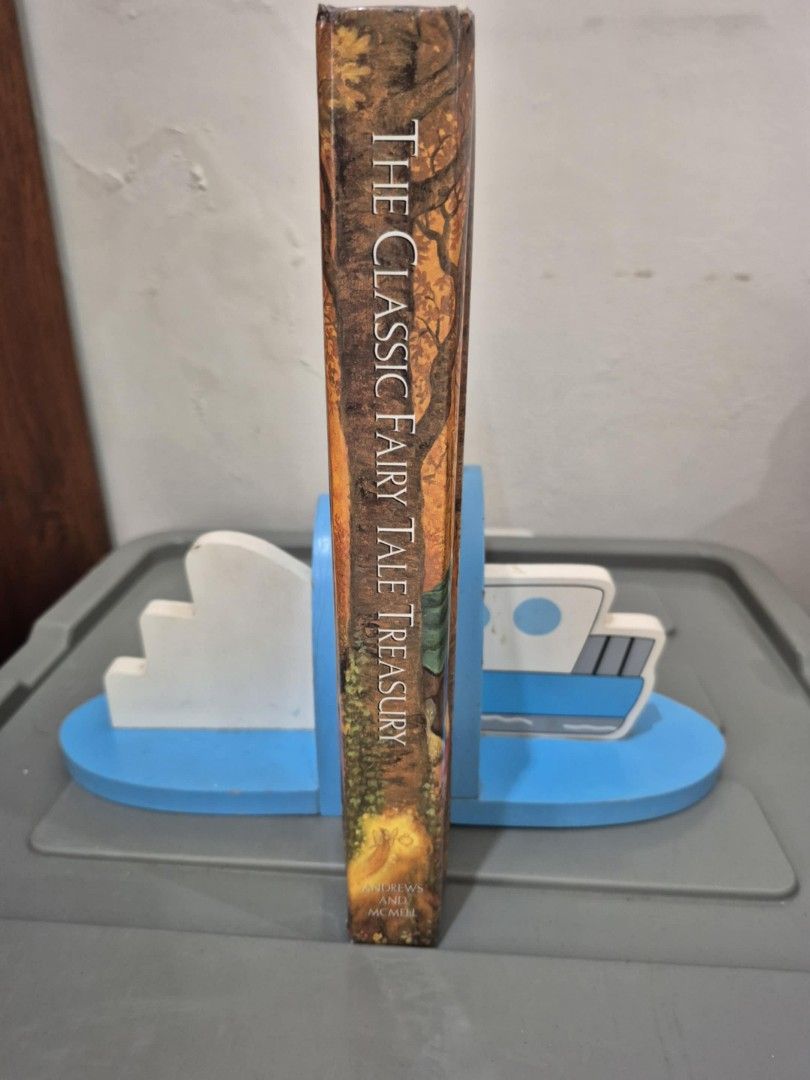 The Classic Fairy Tale Treasury (Category: Storybooks) located in Muntinlupa City. Submitted by griffinbrookshield (Listing ID 1403440364, Image 2). Description: - Hardcover book: The Classic Fairy Tale Treasury - Contains classic fairy tales - Features colorful illustrations.