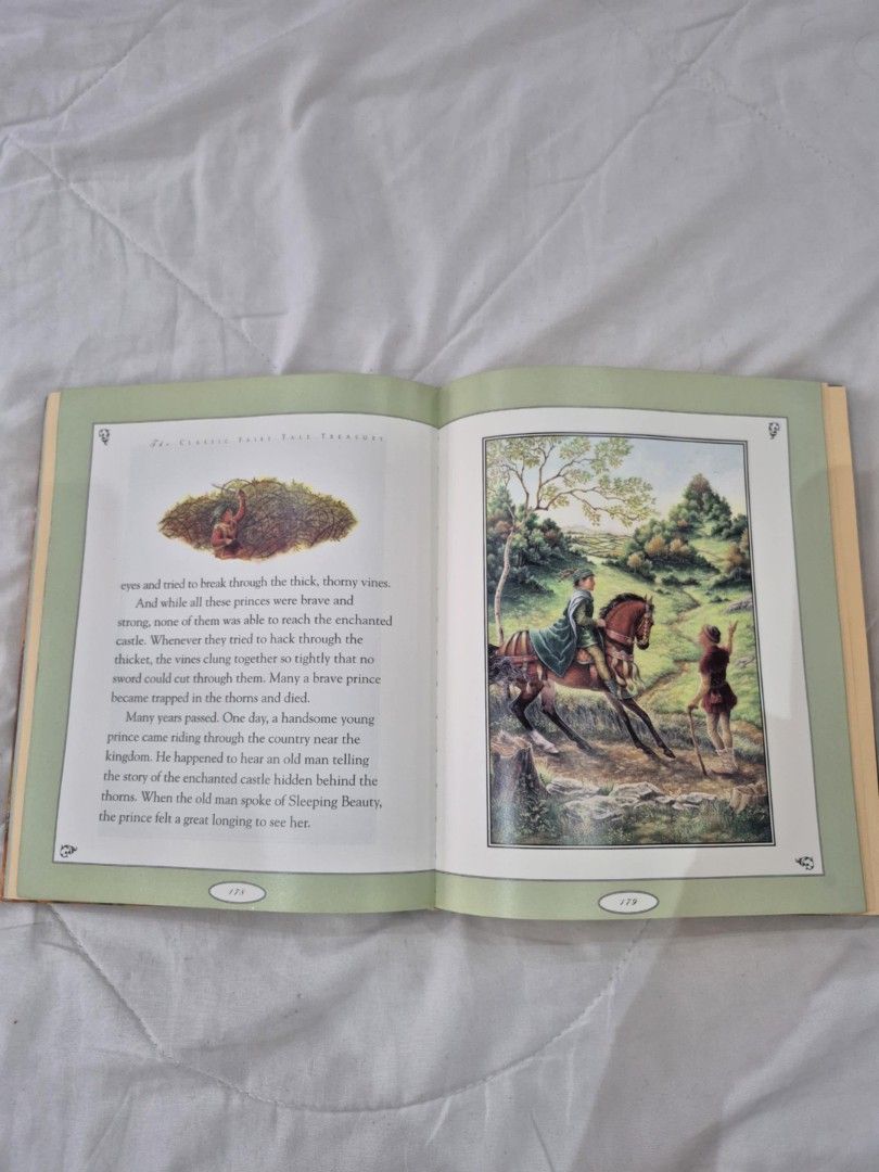 The Classic Fairy Tale Treasury (Category: Storybooks) located in Muntinlupa City. Submitted by griffinbrookshield (Listing ID 1403440364, Image 3). Description: - Hardcover book: The Classic Fairy Tale Treasury - Contains classic fairy tales - Features colorful illustrations.