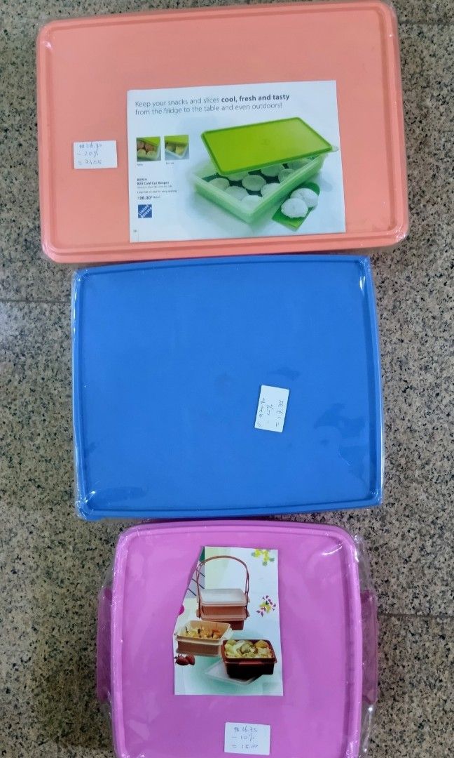 Tupperware Rectangular/Squarish Containers (Category: Food Organisation & Storage) located in Singapore. Submitted by beeyong169 (Listing ID 1403530908, Image 1). Description: Offering 40% off the retail price, which is my best price. From $10. Orange (34x23x7 cm) Retail $26.30, selling $15 Blue (28.5x23x7 cm) Retail $20.90, selling $12 Pink (22x22x7 cm) Retail $16.90, selling $10.