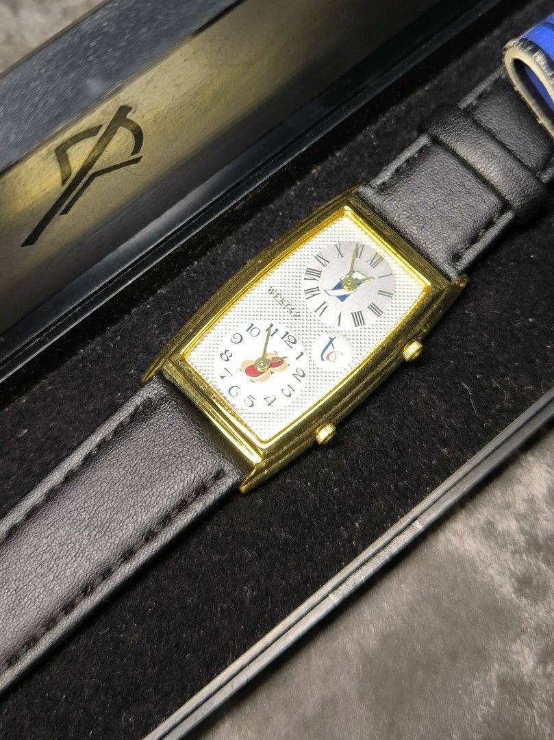 Westar Dual Time Watch with Leather Strap (Category: Women's Watches) located in Pasay City. Submitted by cassiuss (Listing ID 1403598097, Image 1). Description: Elegant Westar dual time watch with a rectangular gold-toned case. Features a white dial with two sub-dials and a black leather strap. The watch comes with its original box. The back of the watch case has the Westar brand name and other details. The strap is genuine leather..