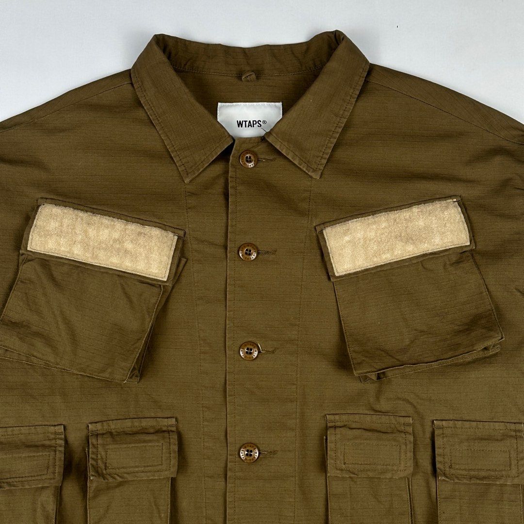 WTAPS A/W 19 Modular LS 01 Jacket (Category: Coats, Jackets and Outerwear) located in Bacoor. Submitted by rekindle. (Listing ID 1403604583, Image 3). Description: - WTAPS A/W 19 Modular LS 01 Jacket - Size: X03 (fits like a Large) - Color: Olive Green - Design: Military-inspired with multiple pockets Dimensions: Width: 26" Length: 28".