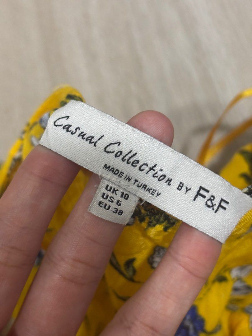 Yellow Dress with Ruffle Sleeves (Category: Dresses) located in Angeles City. Submitted by twixieee_ (Listing ID 1403563998, Image 3). Description: Brand: Casual Collections by F&F Color: Yellow with floral print Size: Medium Style: Button-down midi dress with ruffle sleeves 🌼 *rope/tie missing 🚛 Shipping nationwide via LBC/JnT/Flash (shouldered by the buyer) 📍 Pampanga Location #FloralDress #PrelovedPH #SummerOOTD #YellowDress #BeachOutfit #B