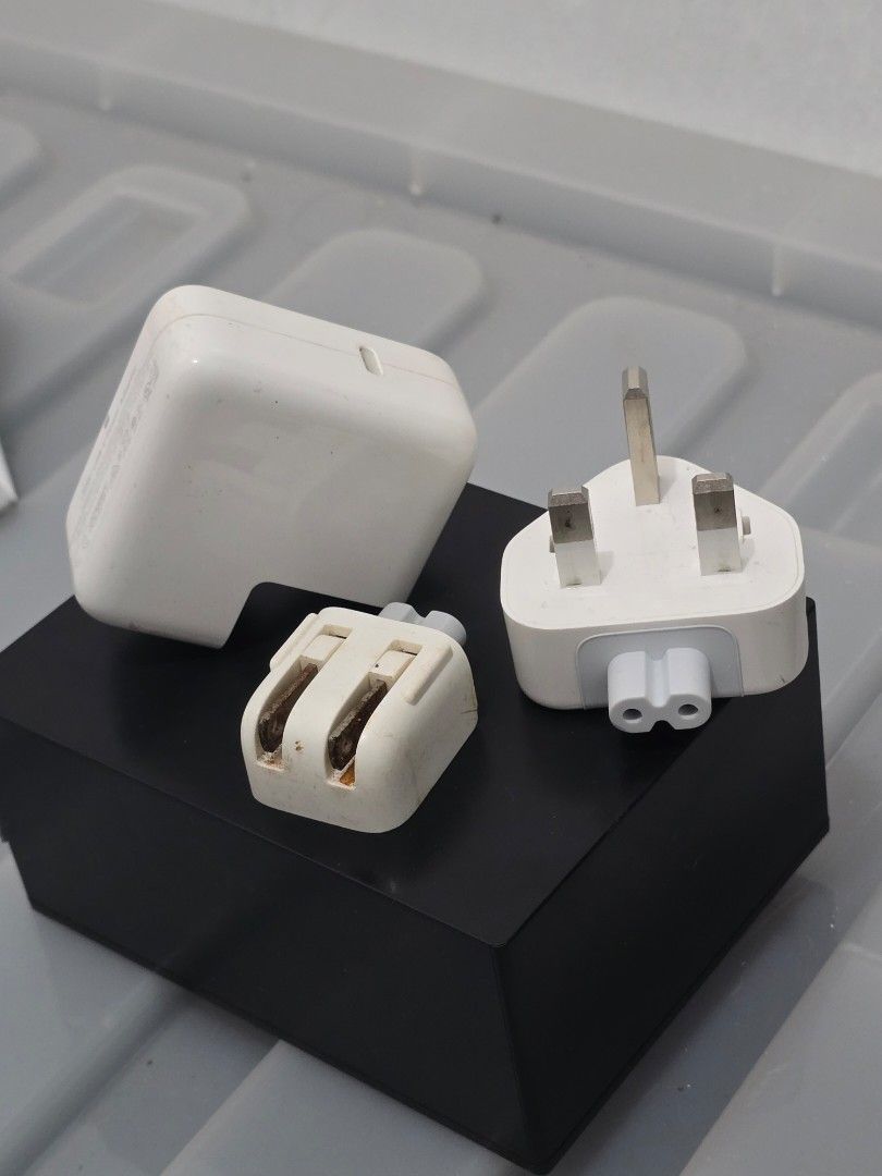 Apple 30W USB-C Power Adapter (Category: Chargers & Cables) located in Pasig City. Submitted by kimjayson (Listing ID 1403789026, Image 1). Description: Apple 30W USB-C Power Adapter. Includes the adapter and two plug attachments (UK & US. US plug is a bit rusty since I only use the UK one) model A2682. RFS - upgraded .