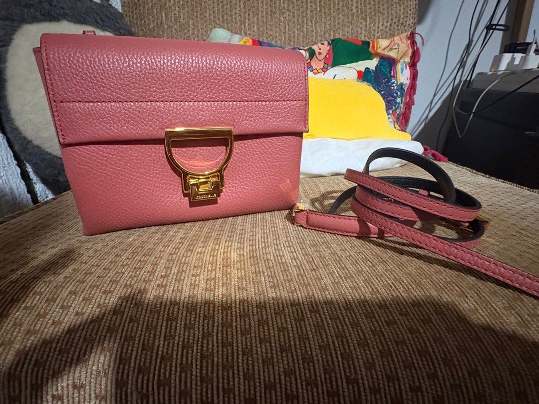 Authentic Coccinelle (Category: Luxury Bags & Wallets) located in Quezon City. Submitted by gringottsss (Listing ID 1403779126, Image 1). Description: Authentic with box calf leather top handle gold-tone clasp detachable shoulder strap Product measurements Depth 5 cm Height 15 cm Width 20 cm.