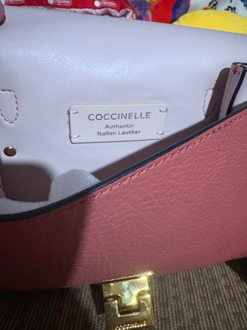 Authentic Coccinelle (Category: Luxury Bags & Wallets) located in Quezon City. Submitted by gringottsss (Listing ID 1403779126, Image 2). Description: Authentic with box calf leather top handle gold-tone clasp detachable shoulder strap Product measurements Depth 5 cm Height 15 cm Width 20 cm.