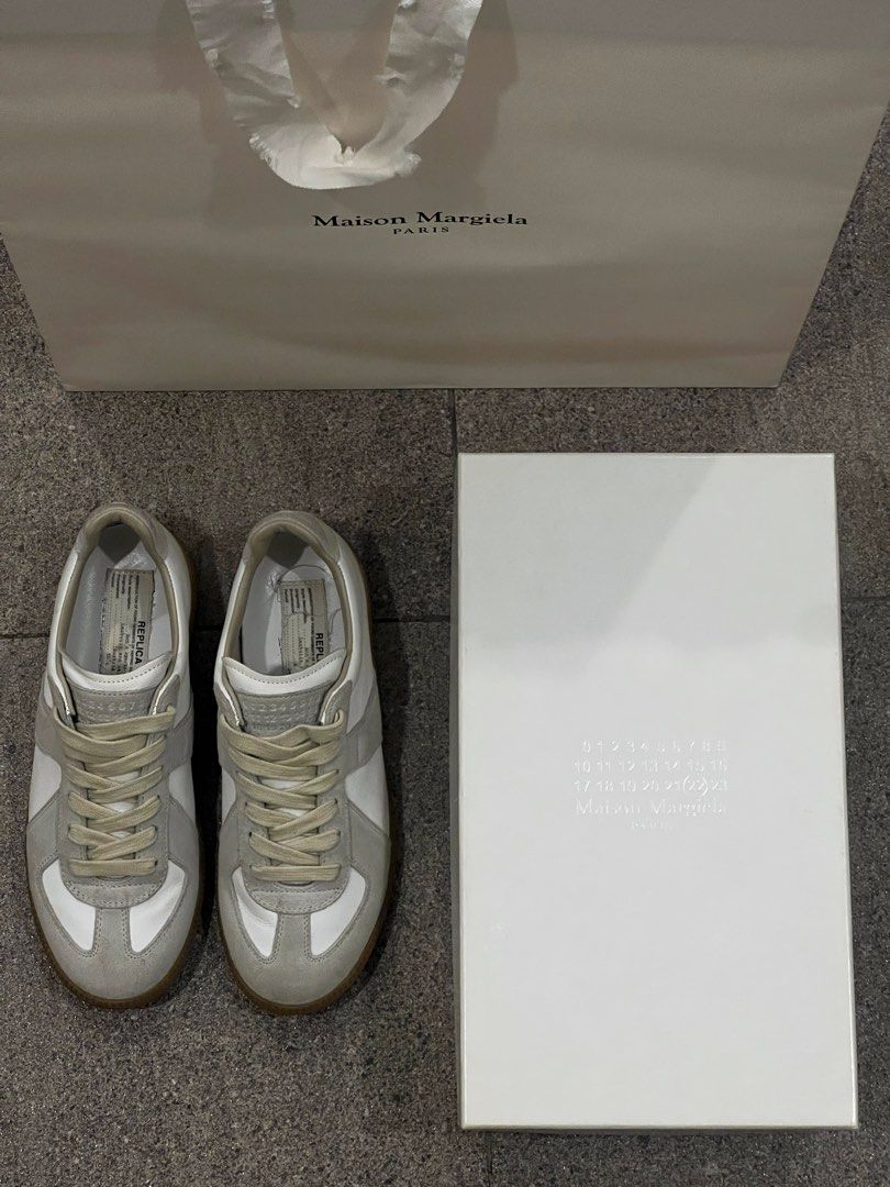 Authentic Maison Margiela GATs Sneakers (Category: Sneakers & Footwear) located in Santa Rosa. Submitted by _nxxy (Listing ID 1403762317, Image 3). Description: Authentic Maison Margiela White Replica Sneakers. Complete with paper bag, box, and dust bag. Lightly used..