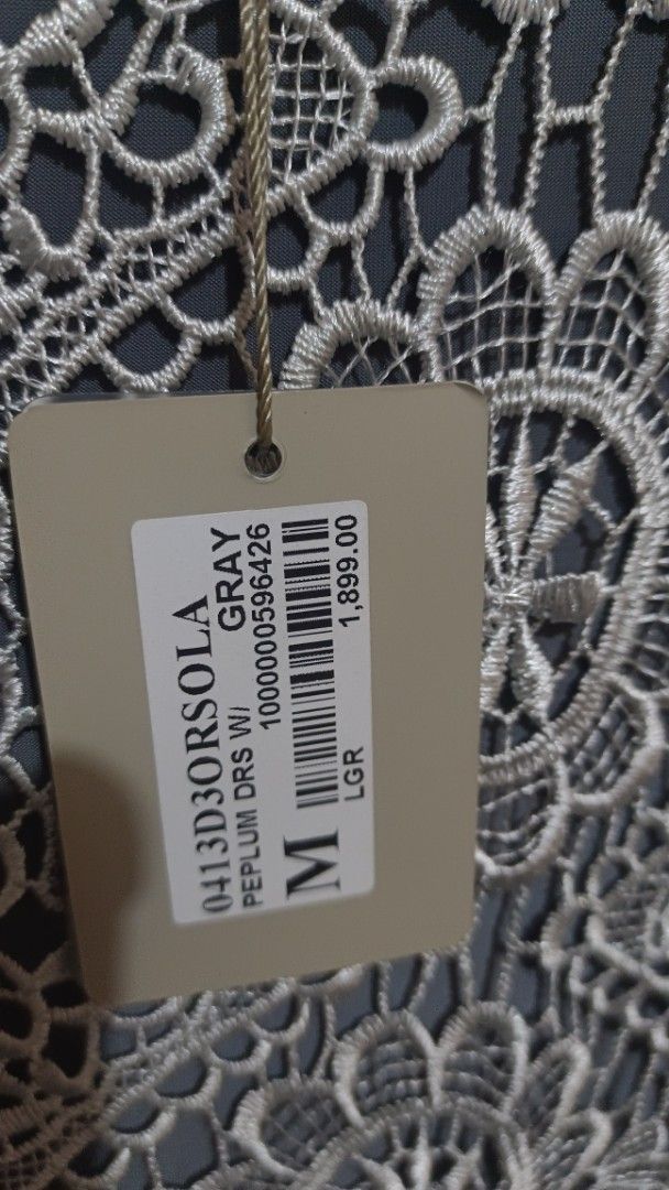 CLN Peplum Dress - Gray - Size M (Category: Dresses) located in Muntinlupa City. Submitted by amara211629 (Listing ID 1403632822, Image 2). Description: - CLN gray peplum dress - Size: M - Features: - Lace detail on bodice - Peplum waist - Condition: New with original tags - Ideal for: Special occasions and nights out.