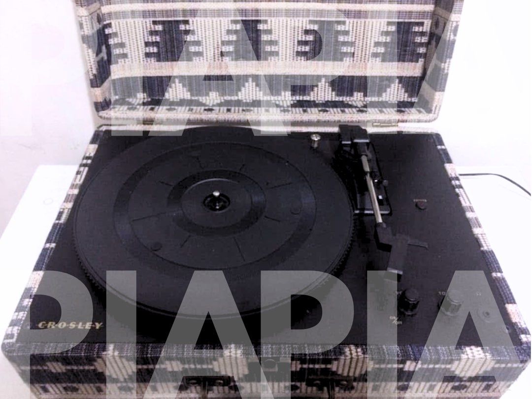 Crosley Portable Turntable (Category: Portable Music Players) located in Manila. Submitted by piapareja1996 (Listing ID 1403735538, Image 2). Description: - Crosley portable turntable - Unique patterned exterior - Black turntable and controls - Secure closing lid - Includes power cable - In good working order.