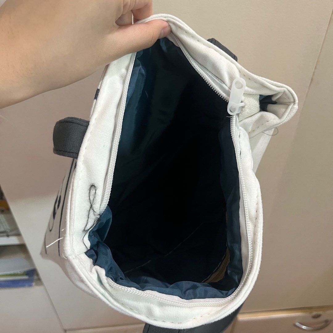 Cute Panda Tote Bag w/ Zipper (Category: Tote Bags) located in Pasig City. Submitted by beabimbop (Listing ID 1403651391, Image 2). Description: 🐼 Used only 1-2 times 🐼 Yung material niya is parang sa kumot (fleece?). Not canvas 🐼 Has a zipper and inner lining 🏷️ Tags: tote bag, panda bag, performative male bag 😆.