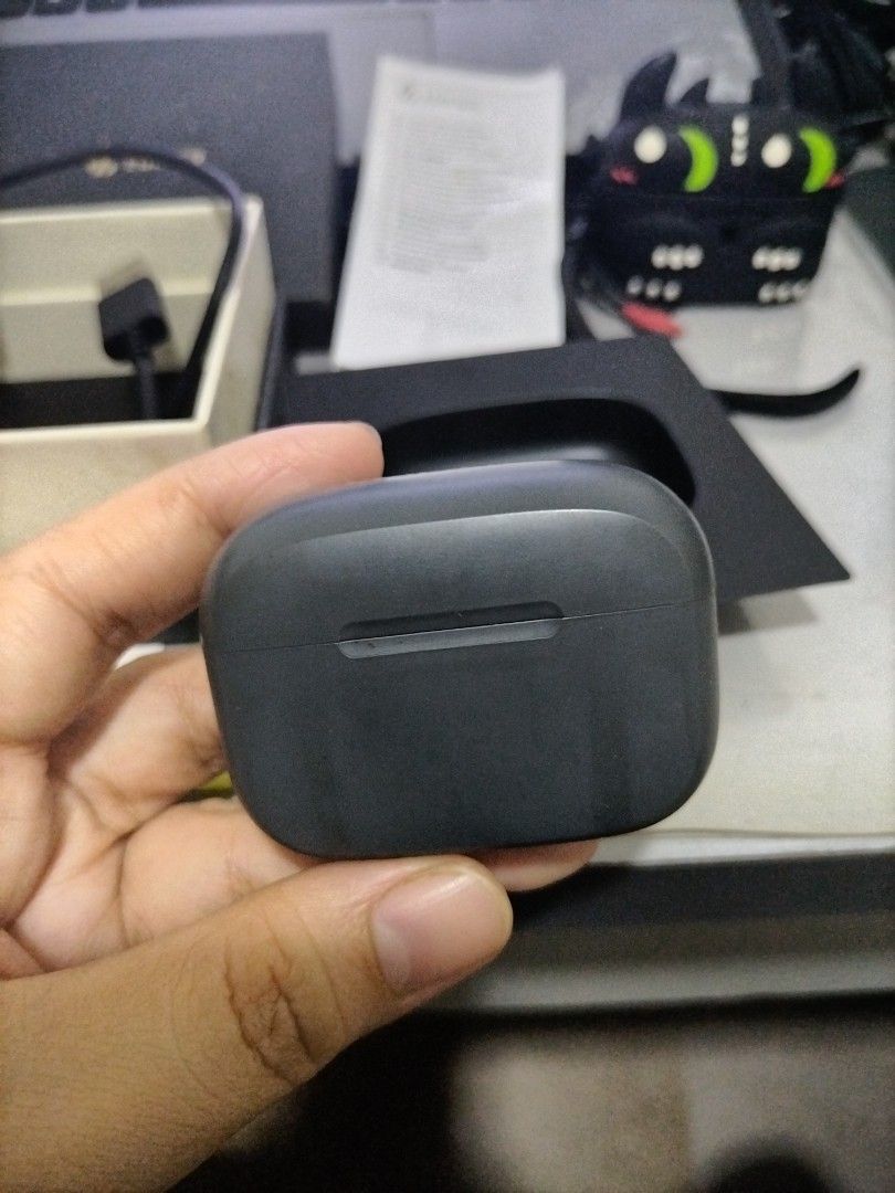 Edifier TWS1 Pro Earbuds (Category: Earphones) located in Manila. Submitted by nittygritty2 (Listing ID 1403782034, Image 3). Description: Edifier TWS1 Pro earbuds in dark grey. Includes charging case, USB-C charging cable, and a Toothless-themed case cover. Features Bluetooth 5.2 connectivity and up to 42 hours of battery life. The earbuds are in-ear style and have touch controls. Original case, manual included. Free black dragon case. No issue.
