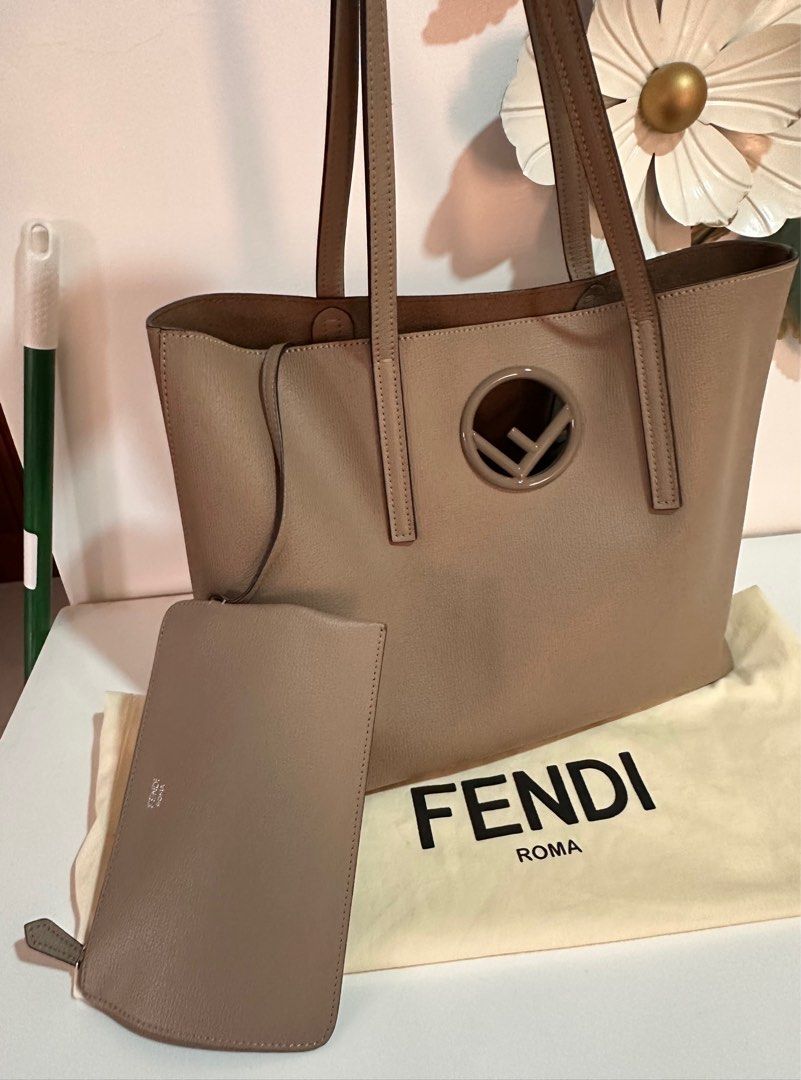 Fendi Roma Tote Bag with Pouch (Category: Luxury Bags & Wallets) located in Cabanatuan. Submitted by suyene88 (Listing ID 1403684891, Image 1). Description: Preloved Fendi Logo Calf Leather Shopper Tote. Authentic. Comes with leather pouch and dust bag. Very good condition some normal signs of use, rubs on corners. .