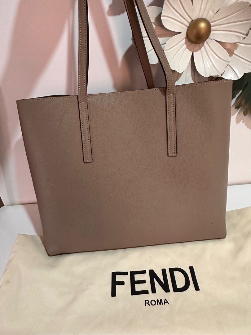 Fendi Roma Tote Bag with Pouch (Category: Luxury Bags & Wallets) located in Cabanatuan. Submitted by suyene88 (Listing ID 1403684891, Image 3). Description: Preloved Fendi Logo Calf Leather Shopper Tote. Authentic. Comes with leather pouch and dust bag. Very good condition some normal signs of use, rubs on corners. .