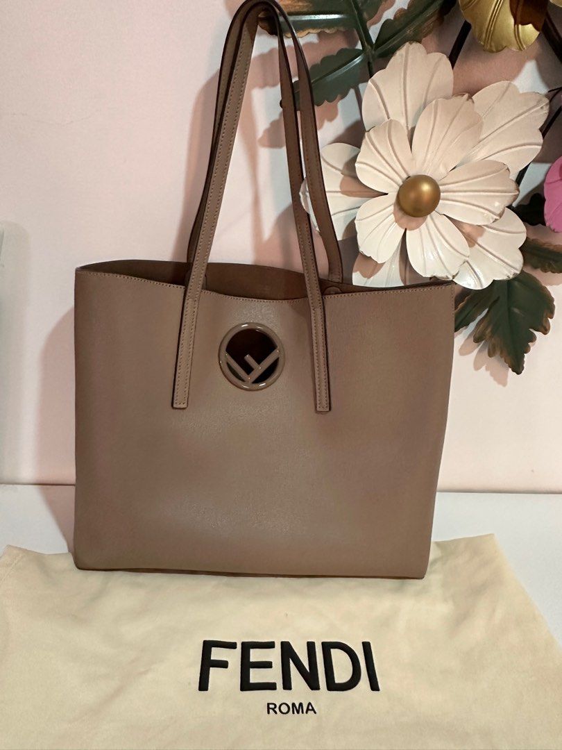 Fendi Roma Tote Bag with Pouch (Category: Luxury Bags & Wallets) located in Cabanatuan. Submitted by suyene88 (Listing ID 1403684891, Image 2). Description: Preloved Fendi Logo Calf Leather Shopper Tote. Authentic. Comes with leather pouch and dust bag. Very good condition some normal signs of use, rubs on corners. .
